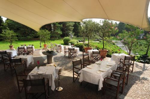 Jardin de l'établissement Cosmo Hotel Torri