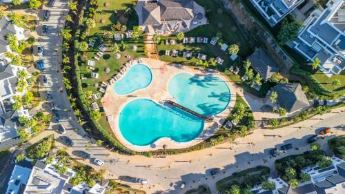 Mirador Estepona Hills Sea View with Pool included & additional Padel Court and Gym by Downtown Apartments Spain