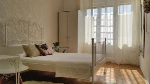Łóżko lub łóżka w pokoju w obiekcie Celtis Apartment