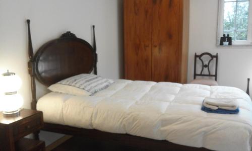 En eller flere senge i et værelse på Casa Amarante Porto