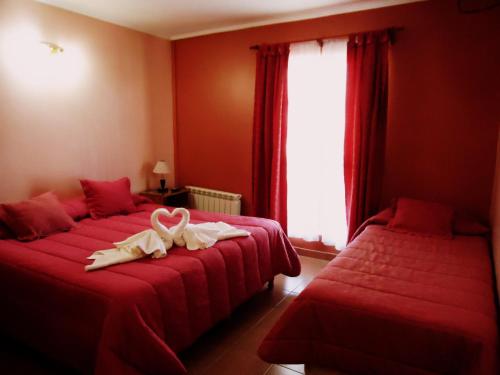 Katil atau katil-katil dalam bilik di Hotel Liporaci