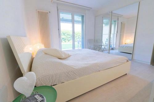 ASCONA ISOLA VERDE Familienfreundliche sonnige Ferienwohnung mit 100m2 eigenem Garten & Klimaanlage