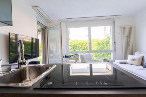 ASCONA ISOLA VERDE Familienfreundliche sonnige Ferienwohnung mit 100m2 eigenem Garten & Klimaanlage