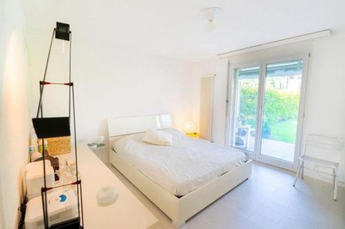 ASCONA ISOLA VERDE Familienfreundliche sonnige Ferienwohnung mit 100m2 eigenem Garten & Klimaanlage