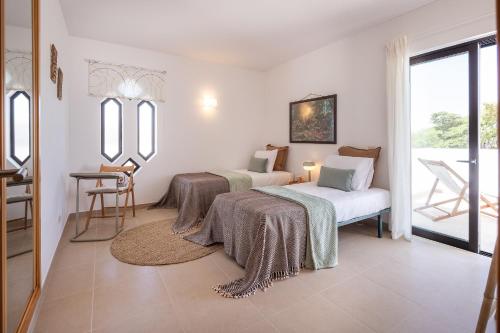 CAJI- Villa w pool near the beach By OCvillas