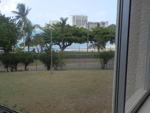 a view of the beach from a window at Turtle Beach Towers in Ocho Rios