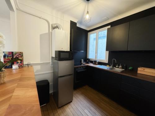 Au cœur de la cité des Sacres - Appartement rénové