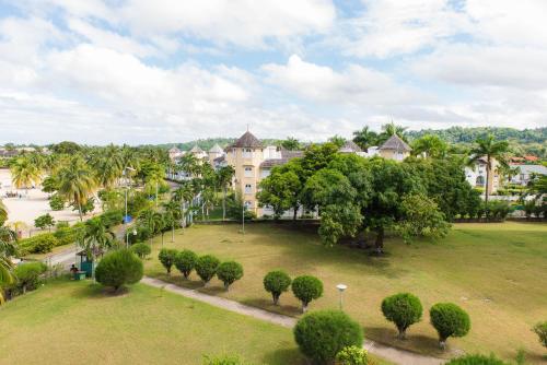 an aerial view of a park with trees and buildings at Turtle Beach Towers in Ocho Rios
