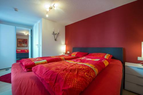 Кровать или кровати в номере Ferienwohnung Theresa