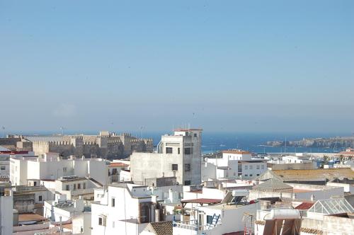 a view of a city with white buildings at Room Tarifa in Tarifa