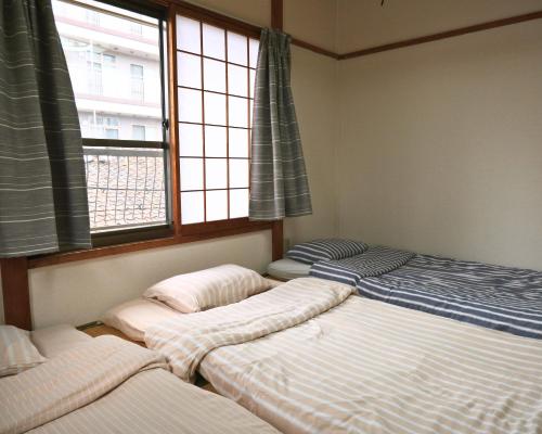 林林の民宿-関空直達,通天閣近い, 3階建て一軒家