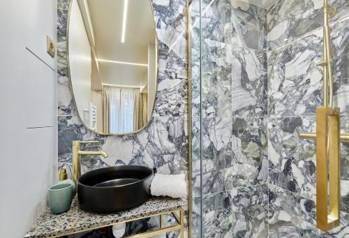 Apartment Le Marais place des Vosges by Studio prestige