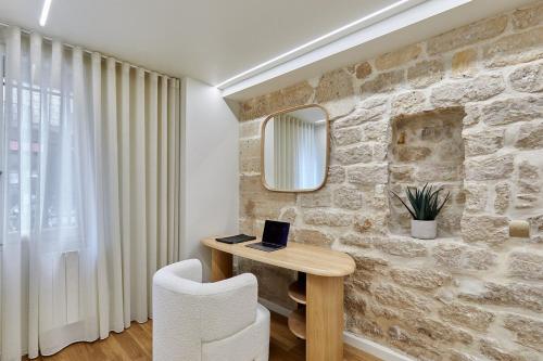 Apartment Le Marais place des Vosges by Studio prestige
