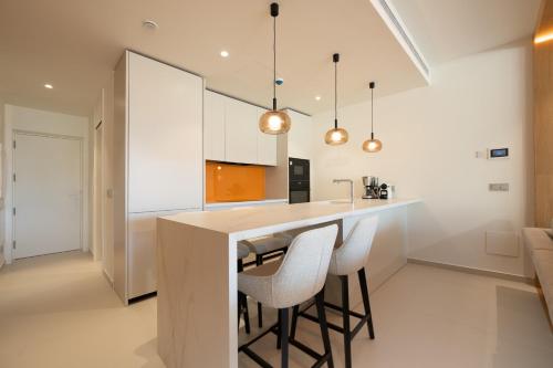 Luxury 2-Bedroom Apartment with Panoramic Sea Views in Reserva del Higuerón