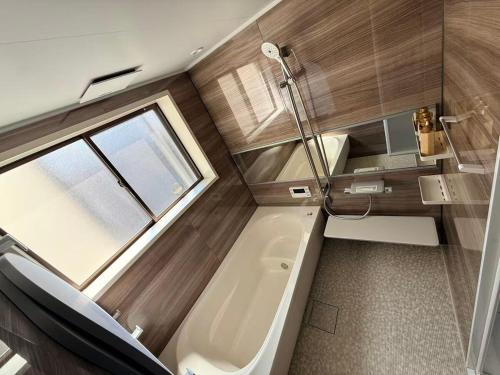 TSUKIMI Japanese-style residence with a warm wooden feel Sleeps 14 comfortably Great access to Namba and Shinsekai