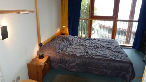 Résidence Aiguille Grive Bat Iii - Appartement 2 pièces 6 personnes en duplex, skis aux pieds, dans le village de Charmettoger à Arc 1800 MAE-2032