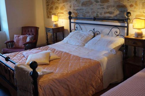 A bed or beds in a room at Agriturismo Bonzalone
