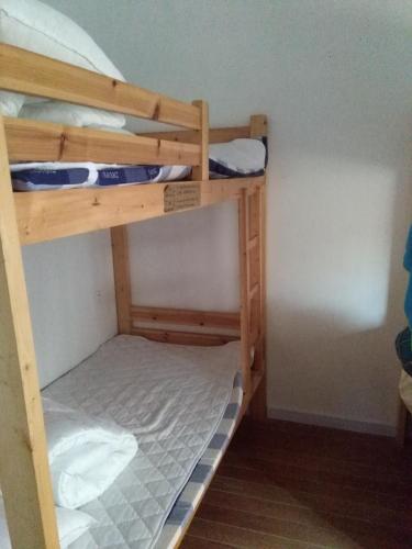 a couple of bunk beds in a room at Suzhou Blue Gate Youth Hostel in Suzhou