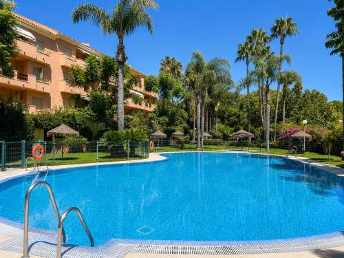 Marbella Dunas de Cabopino 2BR Apartment with Private Garden, Pool & Parking - Magnolia Properties