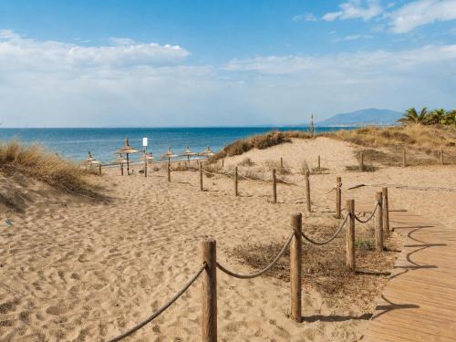 Marbella Dunas de Cabopino 2BR Apartment with Private Garden, Pool & Parking - Magnolia Properties