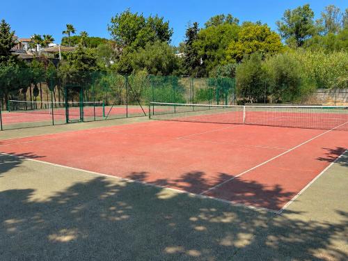 Marbella Dunas de Cabopino 2BR Apartment with Private Garden, Pool & Parking - Magnolia Properties