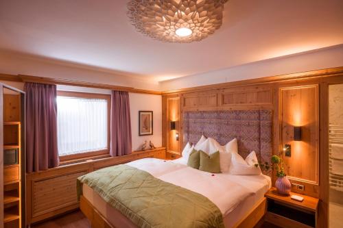 Katil atau katil-katil dalam bilik di Alpin Hotel Garni Eder - Private Living