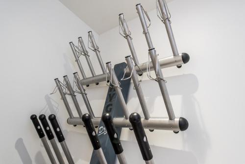 a bunch of knives hanging on a wall at Nazca D2 in Val Thorens