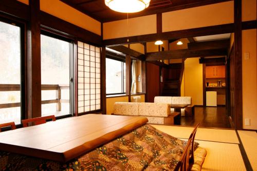 Кровать или кровати в номере Yamazatonoiori Soene