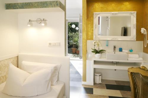 Koupelna v ubytování Hotel Don Giovanni