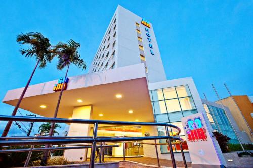 .cls-2{fill:#ff8000}.cls-3{fill:#febb02}.cls-5{fill:#c00}.cls-7{fill:#514d9e}Travel Proud Go Inn Hotel Aracaju Menor preço em .cls-2{fill:#ff8000}.cls-3{fill:#febb02}.cls-5{fill:#c00}.cls-7{fill:#514d9e}Travel Proud Go Inn Hotel Aracaju
