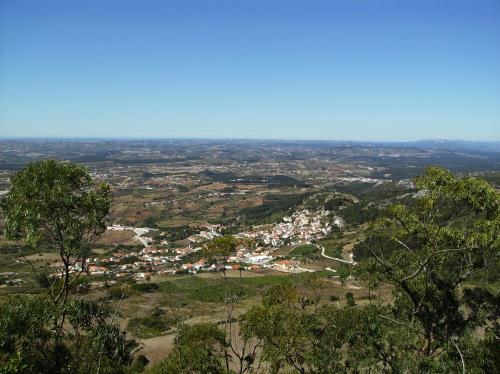 a view of a city from the top of a hill at Casa Do Avô In Montejunto in Cadaval