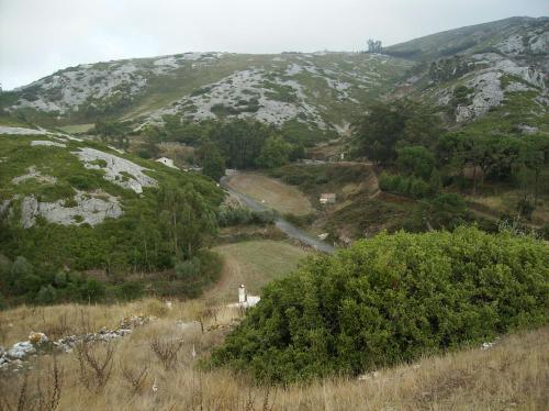 a mountain with snow on the side of it at Casa Do Avô In Montejunto in Cadaval