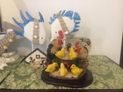 a group of rubber ducks sitting on top of a table at Sunny Villa Homestay in Wujie