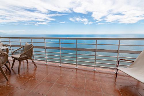 Sea-view suite with 3 balconies and home cinema