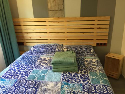 Una cama o camas en una habitación de Piso con piscina y garaje en la Playa de Las Canteras