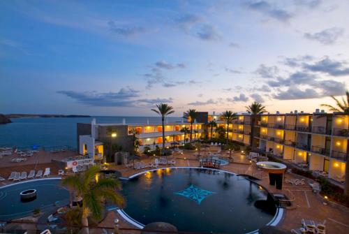 a view of a hotel with a large swimming pool at Hotel Mirador Papagayo by LIVVO in Playa Blanca