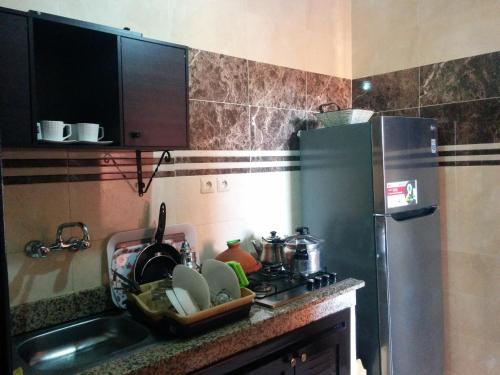 Virtuve vai virtuves zona naktsmītnē Appartement Marrakech