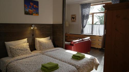 เตียงในห้องที่ Bed & Breakfast Prins Hendrik (Zuidschermer)