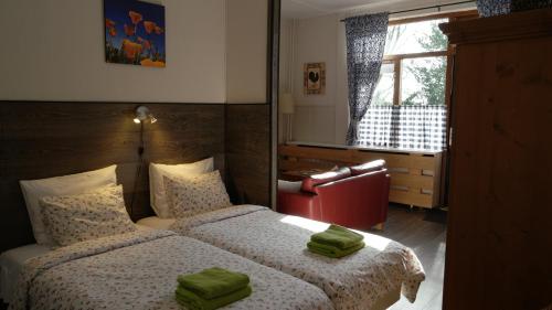 Postel nebo postele na pokoji v ubytování Bed & Breakfast Prins Hendrik (Zuidschermer)