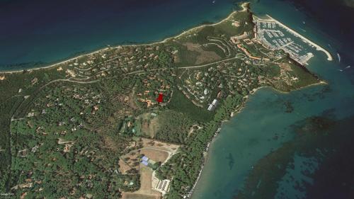 an aerial view of an island in the ocean at Residence Renaione in Punta Ala