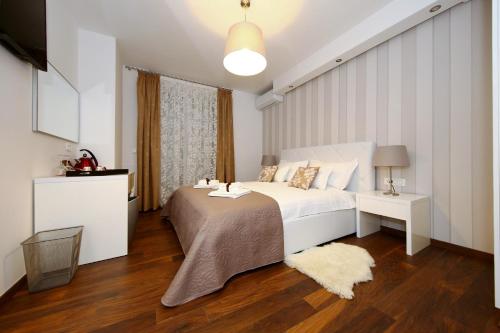 Ένα ή περισσότερα κρεβάτια σε δωμάτιο στο Lipotica Luxury Accommodation