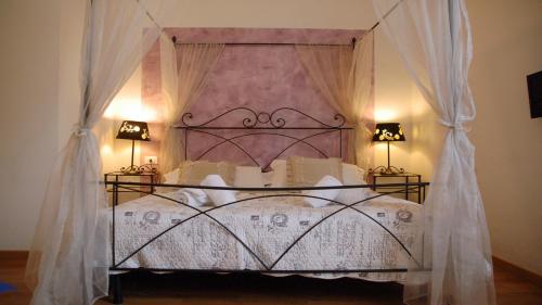 Кровать или кровати в номере Ridolfi Guest House