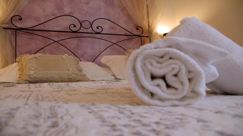 Кровать или кровати в номере Ridolfi Guest House