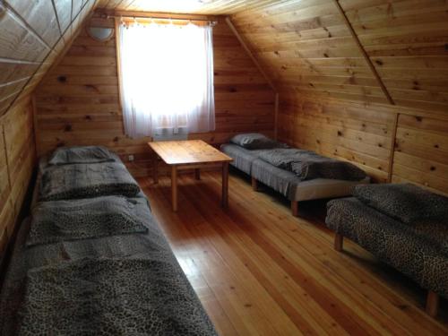 Ένα ή περισσότερα κρεβάτια σε δωμάτιο στο Kempings Lilaste.com