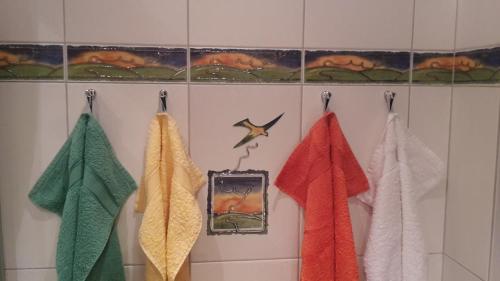 a group of towels hanging on a wall at Appartements Winter Anita in Flachau