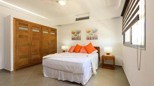 Postel nebo postele na pokoji v ubytování Aligio Apart-hotel & Spa - Las Terrenas