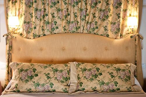 La Locanda Di Cetonaにあるベッド