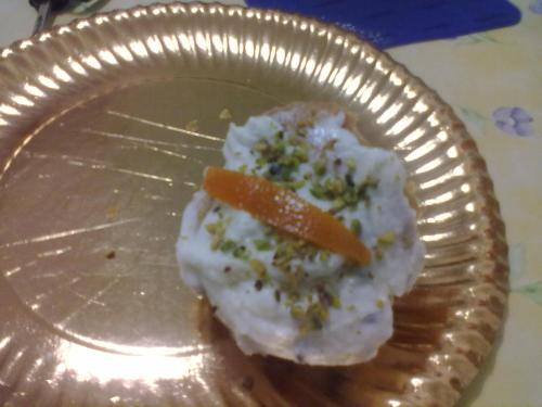 a plate with a piece of meat with a carrot on it at B&B Pacheco in Paceco