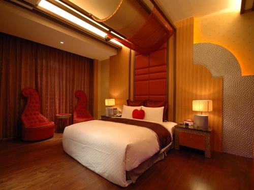 מיטה או מיטות בחדר ב-Norway Forest SPA Motel