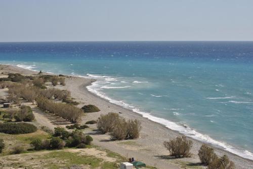 a view of a beach with the ocean at Chouzourakis Studios in Keratokampos
